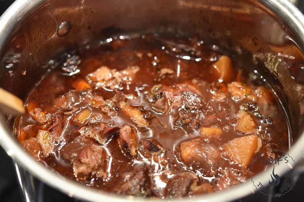 Iberico pork cheeks, simmering.