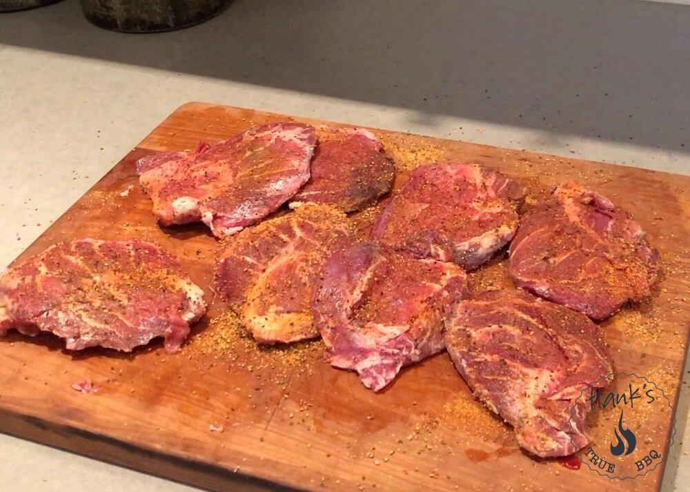 Iberico pork cheeks with rub applied